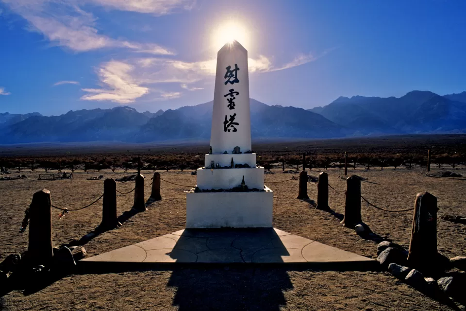 White obelisk monument with Japanese writing at Manzanar Historic Site, former internment camp, California